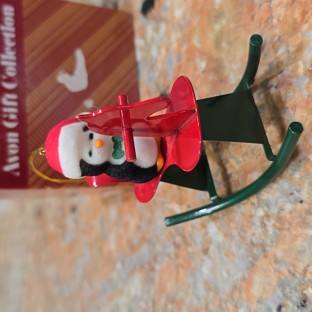 Avon Holiday Jolly Penguin Ornament On Rocking Horse Red and Green In Box